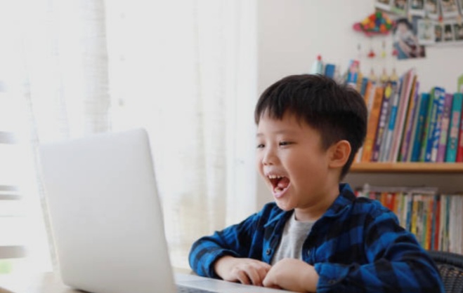 Excited student in online class